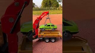 Big Tow Truck Toy with Friction Powered Crane, Lights & Sounds - Roadster with Hooks & Car Included