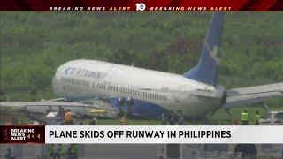 Plane skids off runway in Philippines