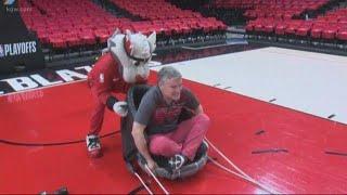 Tim Gordon is turned into a human bowling ball at the Moda Center