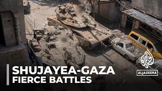 Battles rage in north Gaza as Palestinian fighters ambush Israeli troops