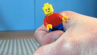 Lego Man gets killed by a giant hand