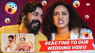 Reacting To Our Wedding Videos | Pearle Maaney | Srinish Aravind