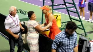 Caroline Wozniacki and Rory Mcilroy kiss after her win over Cetkovska