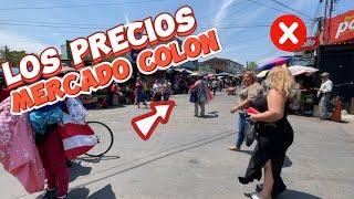 Comprando y comparando Los precios Mercado Colon 