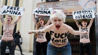 Femen targets Islam in bare-breast Brussels protest