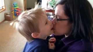 Leo (2 years) giving Mom kisses