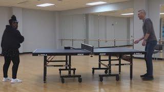Mike Polk Jr. plays table tennis with Pan-American Masters Games champion Lynx Tyus