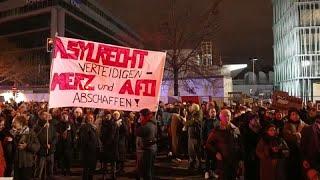 Hundreds protests in Germany against stricter migration policy backed by far-right