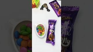 Gems chocolate & Diary milk lollipop popsicle #shorts #youtubeshorts #shortsvideoviral