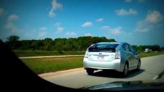 Idiot in a silver Toyota Prius hogging the fast lane.