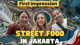 Trying STREET FOOD for the first time in Jakarta by night!  With Angie again! Indonesia