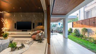 Step inside this 7000 Sq Ft tranquil contemporary bungalow with clean lines & natural materials.