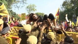 Tibetan youth protest outside Chinese embassy to mark 60th year of 1959 uprising