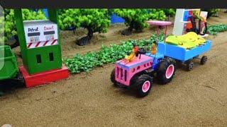 mini diy farm in which tractor is filling the fuel to petrol pump and farmer growing crops #mini#diy