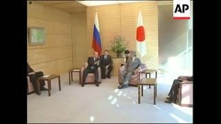 Putin at Japan-Russia Economic Cooperation Forum with Koizumi