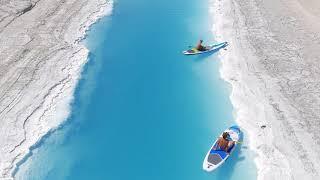 Blue canal across the salt flats