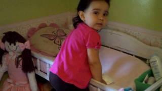 Sofia prepping for diaper change