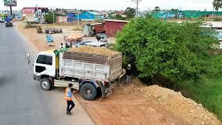 Perfect action Dump truck unloading soil filling up & Technique operator Bulldozer Working push soil