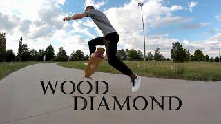 Francesco Bagatella dancing with longboard Wood Diamond