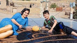 Rural Life Iran: Carpet and Clothes Washing in the Village