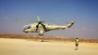 Mi-24 hind of the Syrian Air Force at a very low level flying.