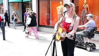 Crowd stops to watch as Leila Jane knocks Dolly Partons "Jolene" out of the park.