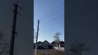 Russian Kaliber missile over a Ukrainian village