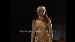 Raveena Tandon wearing a golden dress for a dance scene of a Bollywood film