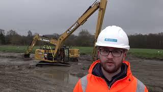 Flannery Plant Hire working with a long reach Cat