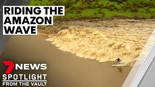 Riding the world's most dangerous and longest wave | Amazon Pororoca | 7NEWS Spotlight