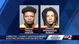 2 arrested, 1 suspect wanted in December homicide outside Sanford Best Buy