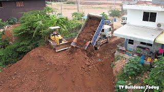 Step2,New project!! Good action D31P KOMATSU Dozer push the soil to fill the pit next to the house