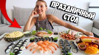 Holiday dishes in Thailand, sushi rolls, fish in salt, spring rolls