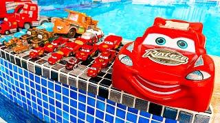 Disney Pixar Cars falling into deep pool, Lightning McQueen, Tow Mater, Mack, Sally, Francesco