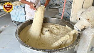 Working with stretchy dough to bake Barbari bread