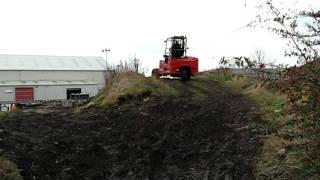 Moffett truck-mounted forklift demonstrating its amazing off-road capabilities!