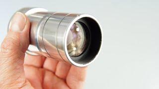 Adapting projector lenses to digital cameras.   Including pros and cons of using projector lenses.