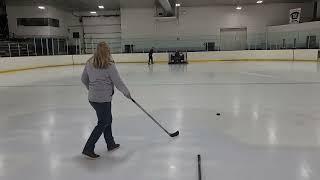 Cheryl is practicing for Shoot The Puck.