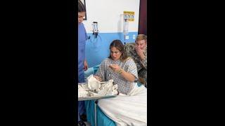 Military husband surprises wife in the delivery room 