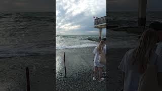 20 Sochi storm embankment, beach people sunbathe