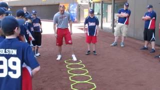 Reds ATC Steve Baumann shows kids agility drill