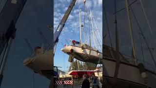 Our  sailboat took its first flight today.10 feet in the air, 1 giant crane, 0 accidents.