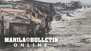 Strong winds and rough waves slam houses in Tondo, Manila