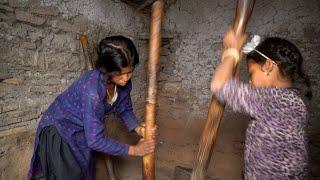 dharme brother's daughters are grinding rice in the stone || Traditional technology || @ruralnepall