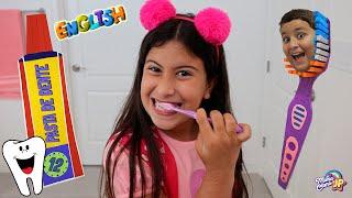 Maria Clara and JP learn the importance of brushing their teeth.