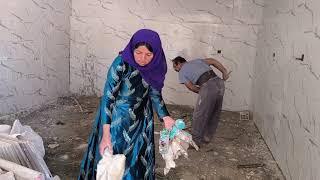 Ziba and Azizullah are preparing the shop for paving stones