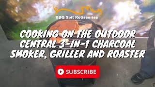 Cooking on the Outdoor Central 3-in-1 Charcoal Smoker, Griller and Roaster