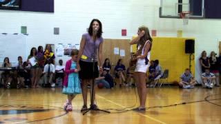 14-year-old Abby Miller performs "If I Can Hold Your Hand" at halftime (written by Andy Grube)