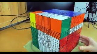 2 year old solves giant rubix cube...