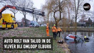 Duiker vist te water geraakte auto uit de vijver bij 't Huiken in Elburg | NWVfoto.nl